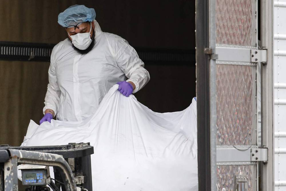 Hospitals overflowing with bodies in US epicenter of virus - clickorlando.com - New York - Usa