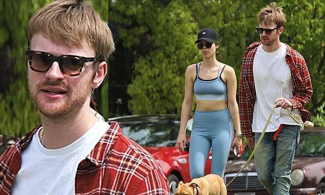 Billie Eilish's brother Finneas O'Connell and girlfriend Claudia Sulewski walk their dog - dailymail.co.uk