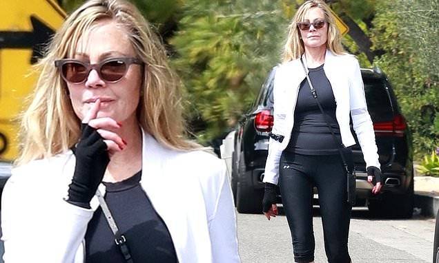Melanie Griffith - Melanie Griffith, 62, looks fit and fabulous in workout gear as she takes stroll in Beverly Hills - dailymail.co.uk - state California - city Beverly Hills