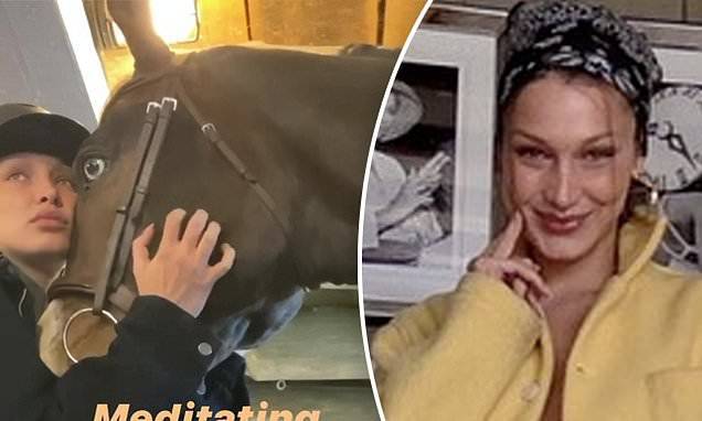 Bella Hadid - Bella Hadid cuddles up to her horse and says she is 'meditating' while isolating on ranch - dailymail.co.uk - state Pennsylvania