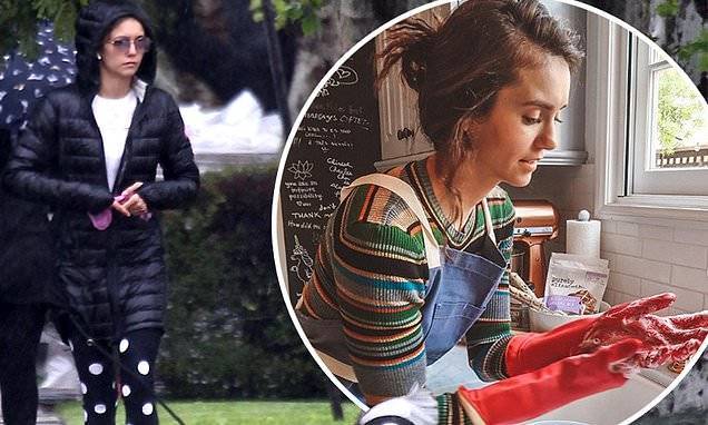 Nina Dobrev - Nina Dobrev takes an isolation break to walk her dog after encouraging fans to be safe amid COVID-19 - dailymail.co.uk - Los Angeles