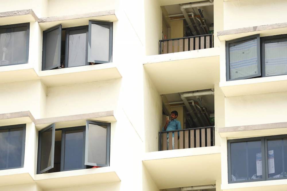 Singapore battles virus hotspots in migrant workers' dorms - clickorlando.com - Singapore - city Singapore - city Kuala Lumpur