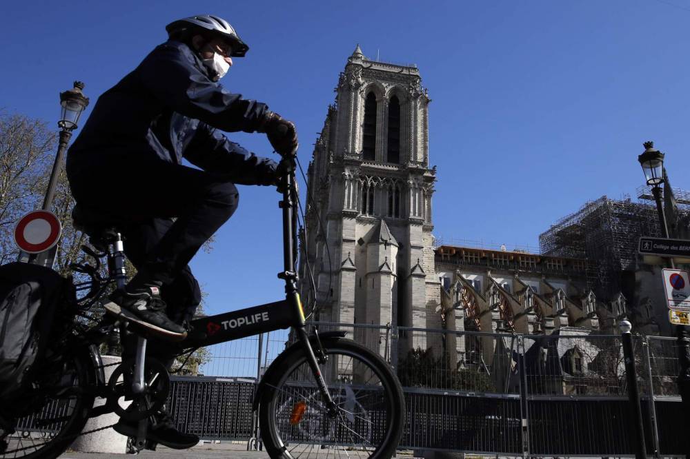 Still scarred, Notre Dame lives anew in coronavirus crisis - clickorlando.com - France