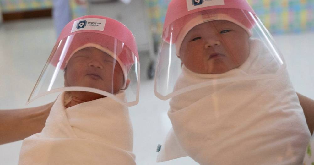 Newborn babies are being given mini visors to protect them from coronavirus - mirror.co.uk - Thailand - city Bangkok