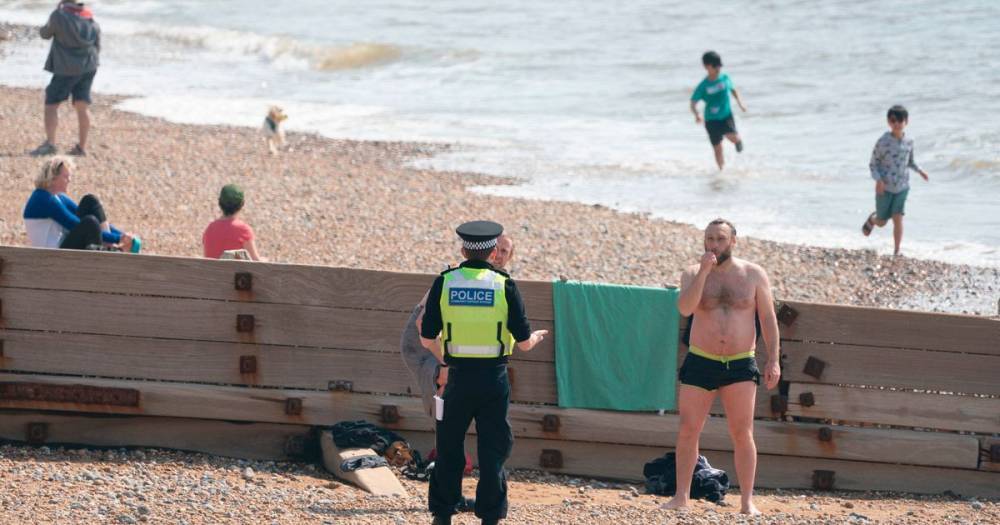 Boris Johnson - Dominic Raab - Cov-idiots flout UK lockdown to hit the beach and sunbathe as temperatures soar - dailystar.co.uk - Britain