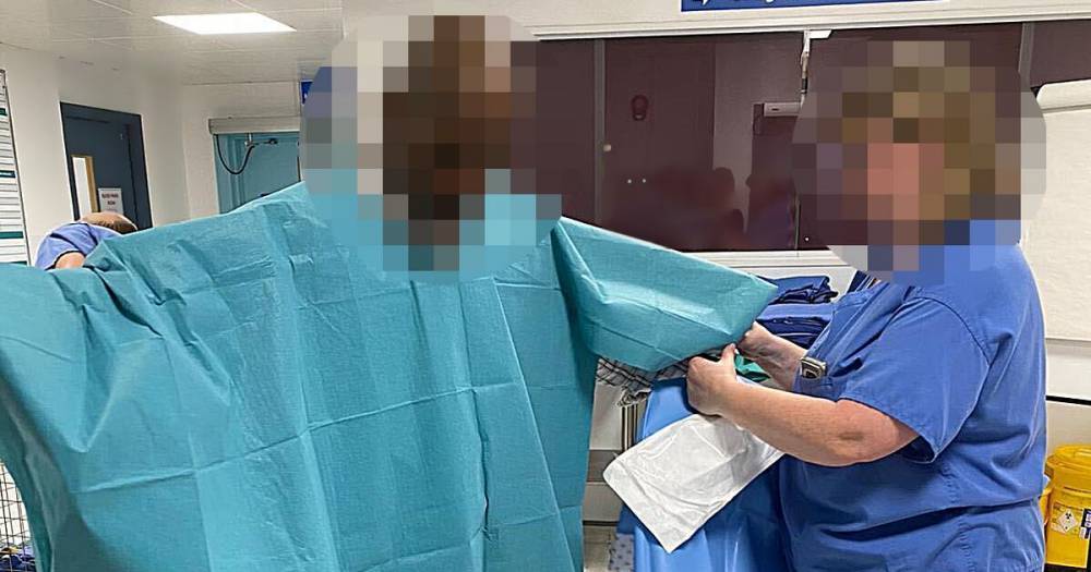 NHS medics cut up hospital curtain to make gown amid massive PPE shortages - mirror.co.uk