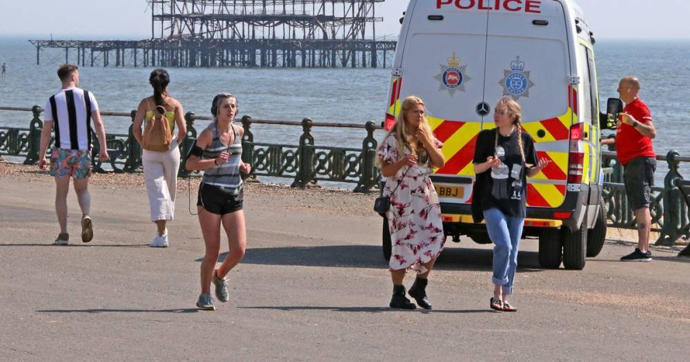 Police and military boats patrol beaches as Brits continue to ignore lockdown - mirror.co.uk - Italy - Spain - Britain