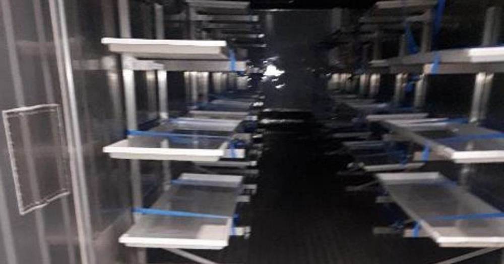 Devastating pictures show UK coronavirus morgue with hundreds of rows for coffins - dailystar.co.uk - Britain - London