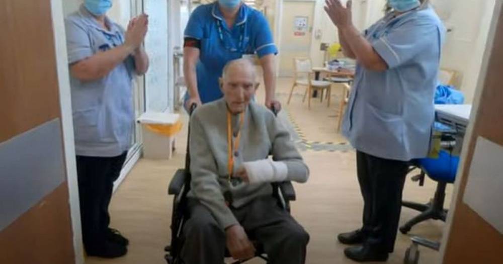Heartwarming moment WWII veteran leaves hospital after recovering from coronavirus - mirror.co.uk
