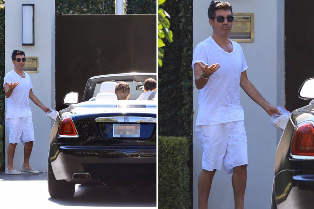 Simon Cowell - Lauren Silverman - America’s Got Talent judge Simon Cowell looks annoyed as he locks himself out of his home - thesun.co.uk