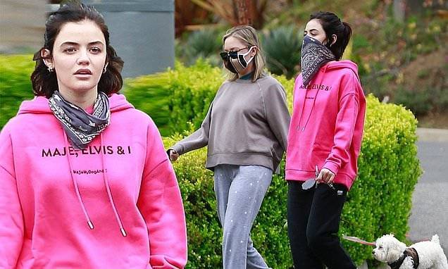 Easter Sunday - Lucy Hale - Lucy Hale gets all masked up with a bandanna to take her maltipoo Elvis out for an Easter stroll - dailymail.co.uk - Los Angeles - city Los Angeles