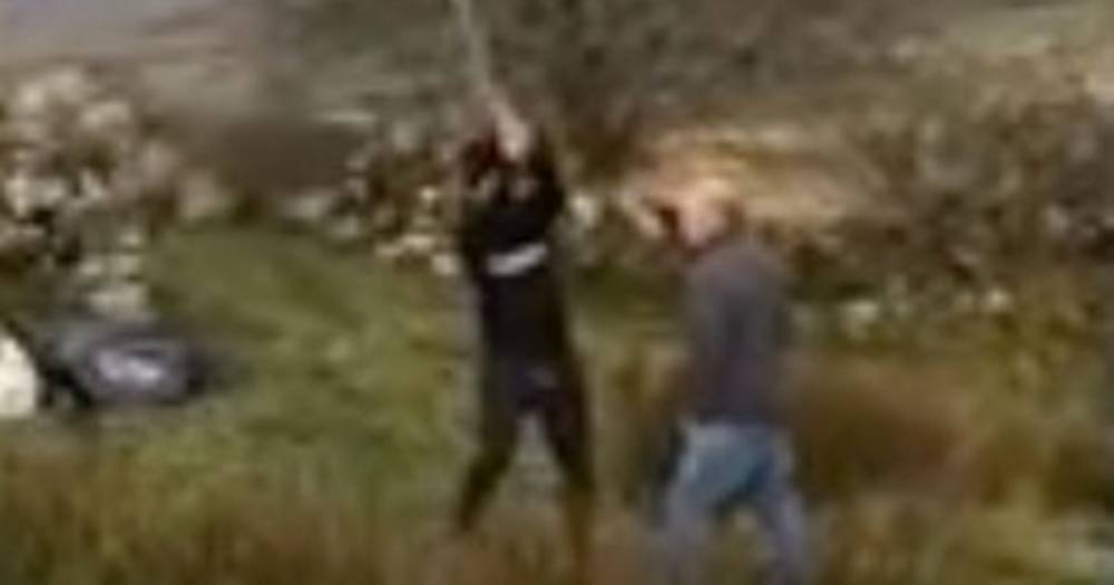 Man camping in lockdown caught on video threatening local dad with a giant stick - dailystar.co.uk