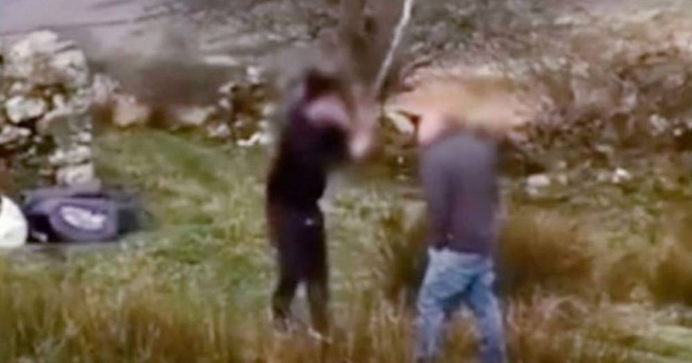 Shocking moment camper appears to threaten man with stick after being asked to leave North Wales beauty spot - manchestereveningnews.co.uk