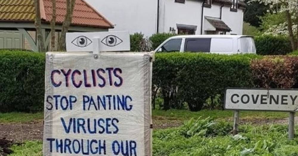 Angry villagers erect 'ridiculous' sign demanding cyclists 'stop panting coronavirus' - dailystar.co.uk - Britain