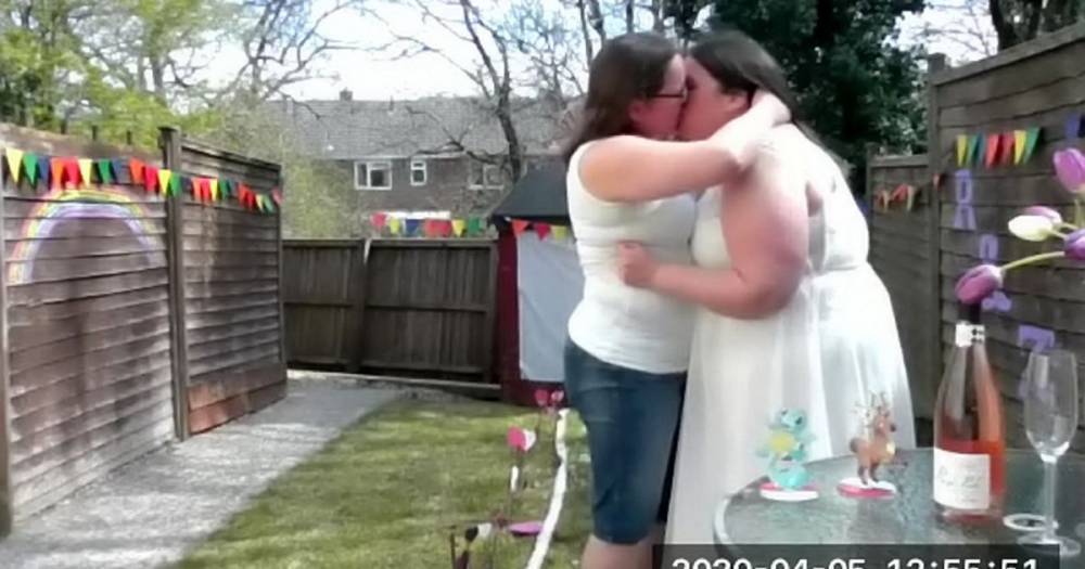 Couple tie the knot on Zoom - because they had already got matching wedding date tattoos - dailystar.co.uk