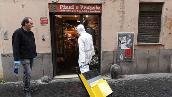 Italy's daily coronavirus death toll climbs by 602 to 21,067 - livemint.com - Usa - Italy - Spain - city Rome