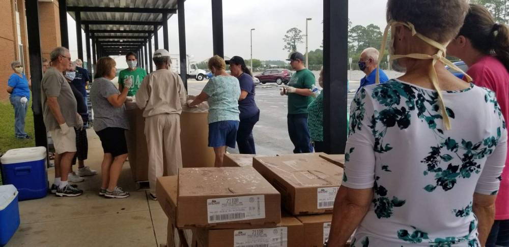 Response to drive-thru food banks in Flagler ‘tremendous’ amid coronavirus pandemic, organizers say - clickorlando.com - state Florida - county Flagler