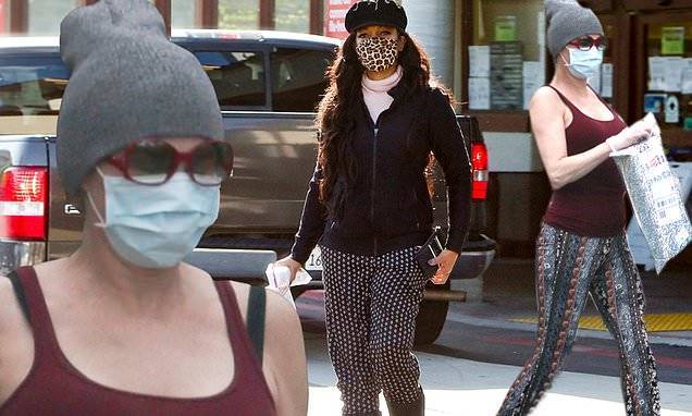 Garcelle Beauvais - Brandi Glanville and Garcelle Beauvais step out separately wearing face masks in LA - dailymail.co.uk - Los Angeles - city Los Angeles