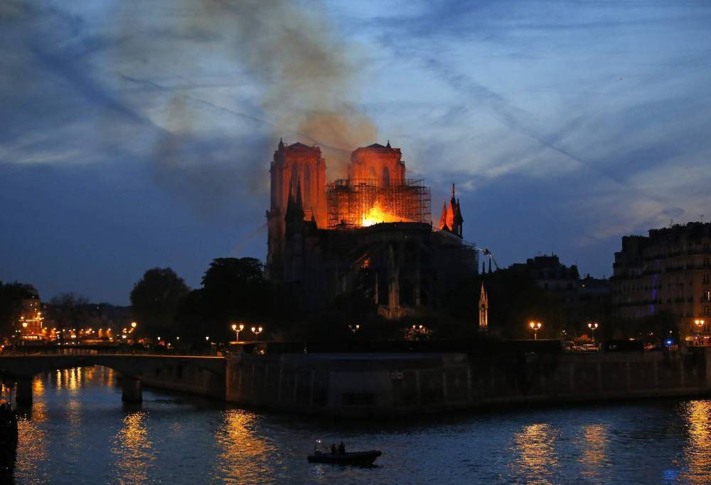 A year after blaze, Notre Dame restoration halted by virus - clickorlando.com - France