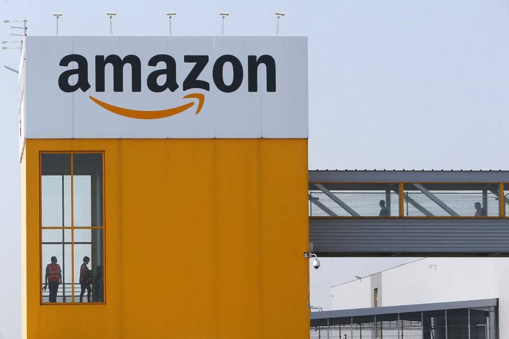 Amazon suspends all activity in France amid virus crisis - clickorlando.com - France