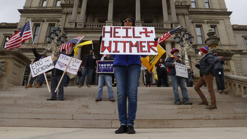 Gretchen Whitmer - Hundreds protest Michigan governor's social distancing order - clickorlando.com - state Michigan - city Lansing, state Michigan