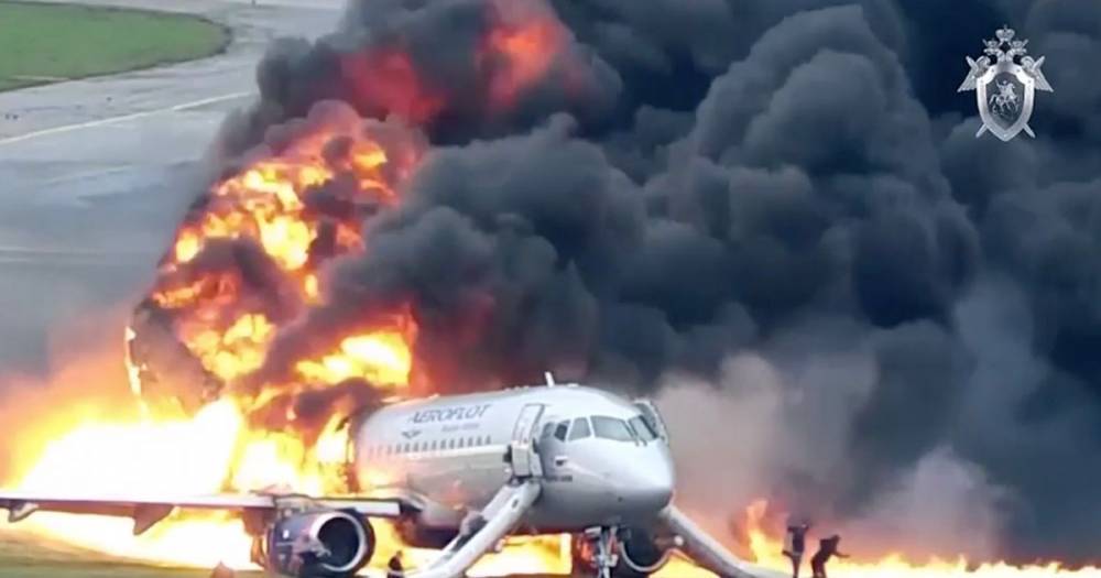 Terrifying new video shows crashed Russian jet skidding off runway in flames - dailystar.co.uk - Russia - city Moscow
