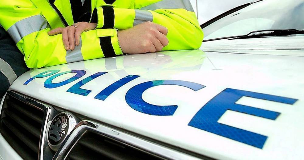 Man charged with assault after 'two police officers spat at by man claiming to have Covid-19' - manchestereveningnews.co.uk - city Manchester
