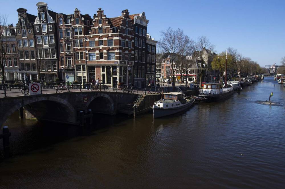 Amsterdam set to ban tourist home rentals in 3 neighborhoods - clickorlando.com - Netherlands - county Hall - city Amsterdam