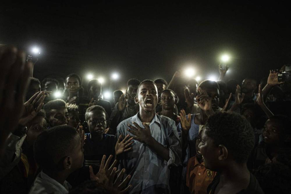 Sudan protest image wins prestigious World Press Photo award - clickorlando.com - Japan - India - France - city Hague - Sudan - city Khartoum