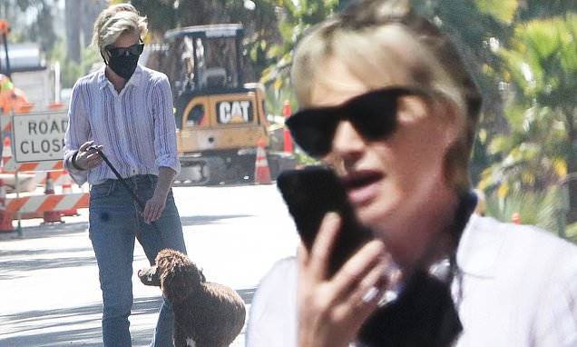 Portia De-Rossi - Ellen DeGeneres' wife Portia de Rossi wears a black mask as she walks her dog - dailymail.co.uk - state California - county Los Angeles - county Santa Barbara