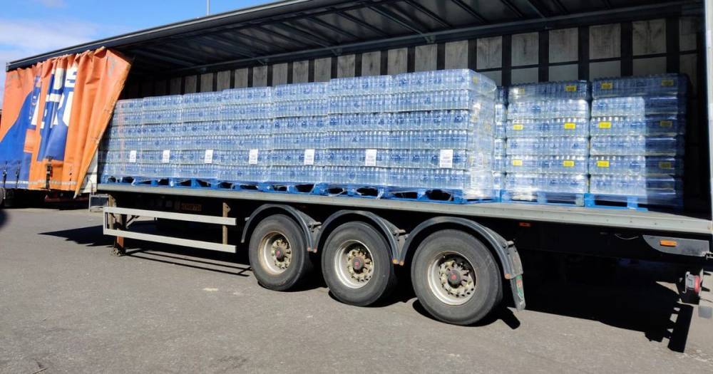 Irn Bru makers give out a lorry load of water bottles to workers at NHS Louisa Jordan super hospital - dailyrecord.co.uk - Scotland - Jordan - county Louisa