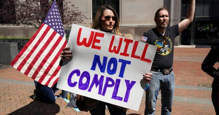 Donald Trump - Ralph Northam - Coronavirus lockdowns prompt scattered protests in U.S. despite death toll of 31,000 - globalnews.ca - city Richmond - state Virginia - city Detroit