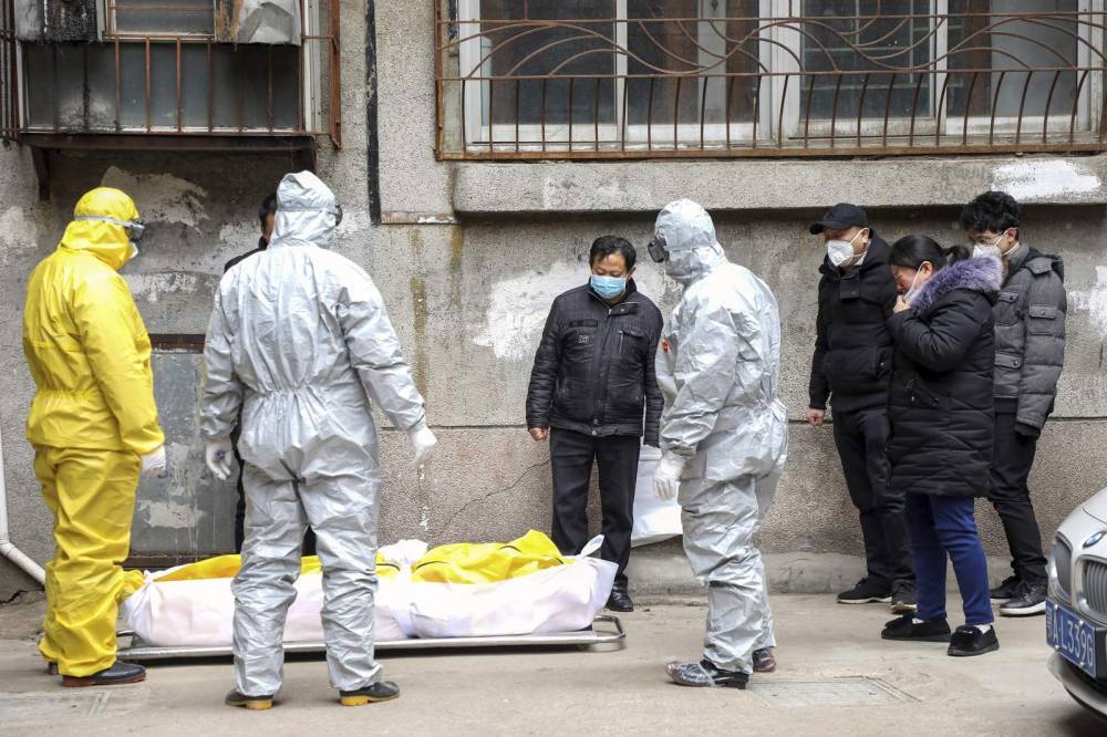 Chinese epicenter Wuhan raises number of virus dead by 1,290 - clickorlando.com - China - city Wuhan - city Beijing