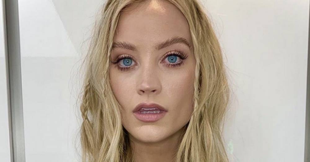 Laura Whitmore - Iain Stirling - Laura Whitmore flashes washboard abs in tiny crop top amid engagement rumours - dailystar.co.uk - Ireland