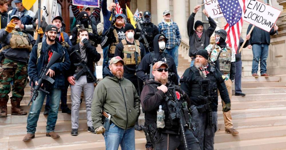 Gun-toting Trump voters march against US lockdown despite world's highest deaths - mirror.co.uk - Usa - state Ohio - state Kentucky - state North Carolina - state Virginia - state Utah - state Michigan