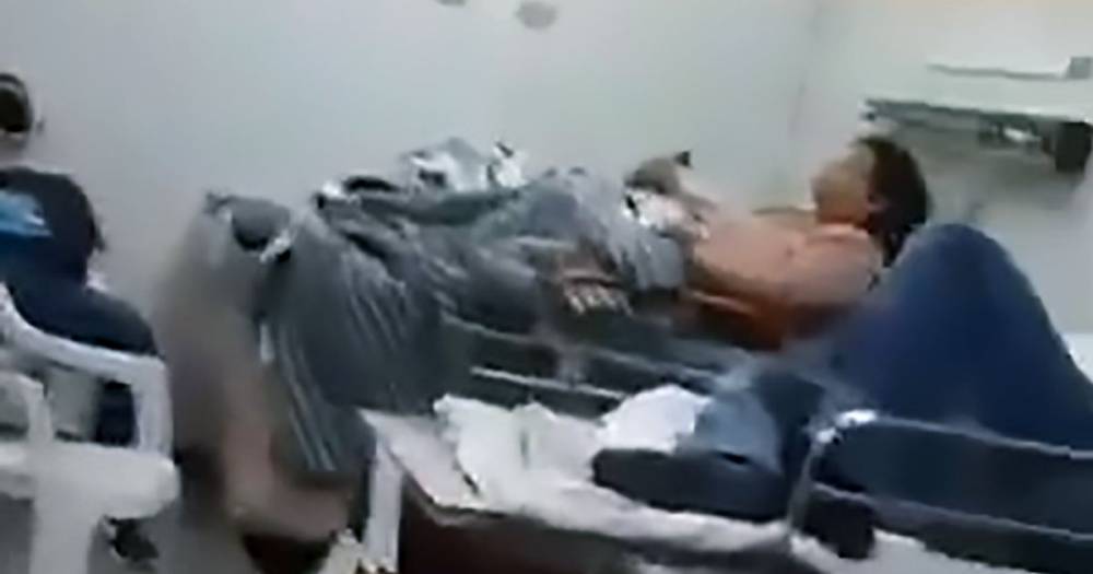 Coronavirus corpses lie next to living patients in chilling footage inside hospital - dailystar.co.uk - Brazil