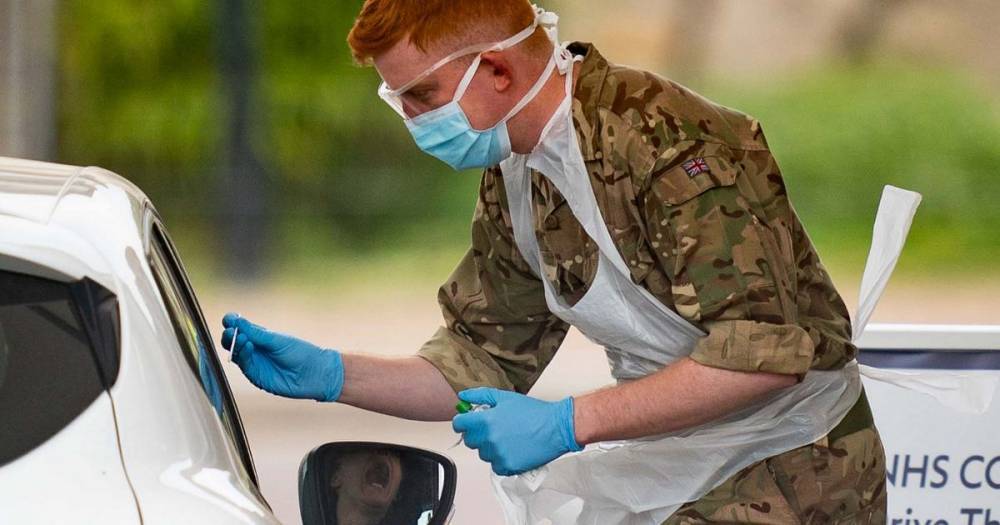 Nicola Sturgeon - UK coronavirus death toll rises to 14,653 after 825 more fatalities - mirror.co.uk - Britain - Ireland - Scotland