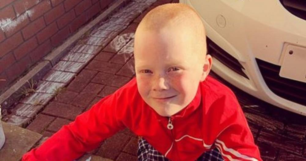 Eight-year-old schoolboy braves the shave and raises almost £1000 for NHS staff - dailyrecord.co.uk