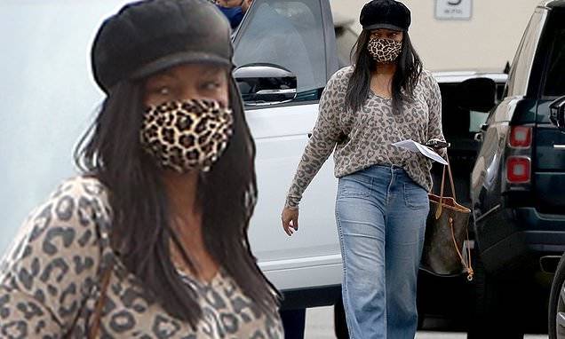Garcelle Beauvais matches face mask with retro chic leopard look as she has her car serviced in LA - dailymail.co.uk - Los Angeles