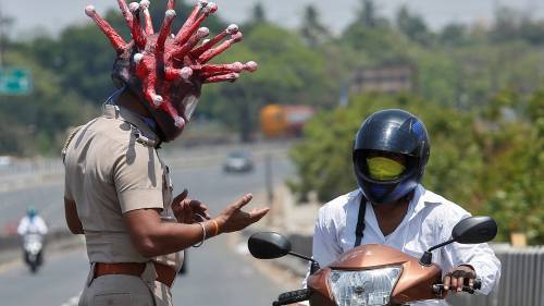 Coronavirus outbreak: Indian police use the ‘coronahelmet’ to raise awareness during lockdown - globalnews.ca - India