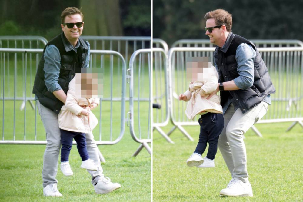 Declan Donnelly grins as he and wife Ali play with daughter Isla in the park - thesun.co.uk - Britain