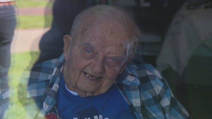 World War II vet celebrates 100th birthday with family through nursing home window - fox29.com