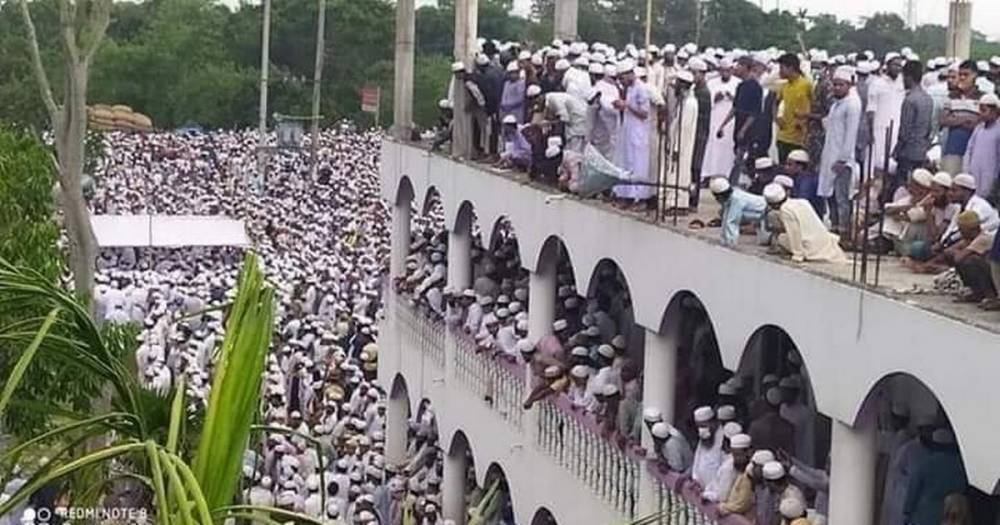 More than 100,000 ignore coronavirus lockdown to attend funeral of popular cleric - mirror.co.uk - Bangladesh - city Dhaka