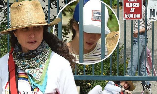 Margaret Qualley - Andie MacDowell CRAWLS under a gate to sneak out of closed park during coronavirus lockdown - dailymail.co.uk
