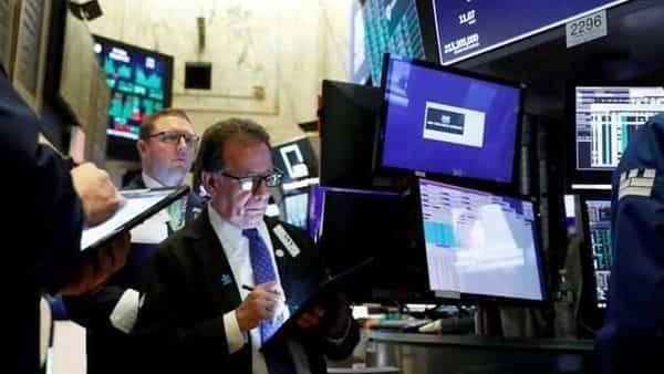 Wall Street drops as US producers can't give crude away, Dow declines over 2% - livemint.com - Usa - state Texas