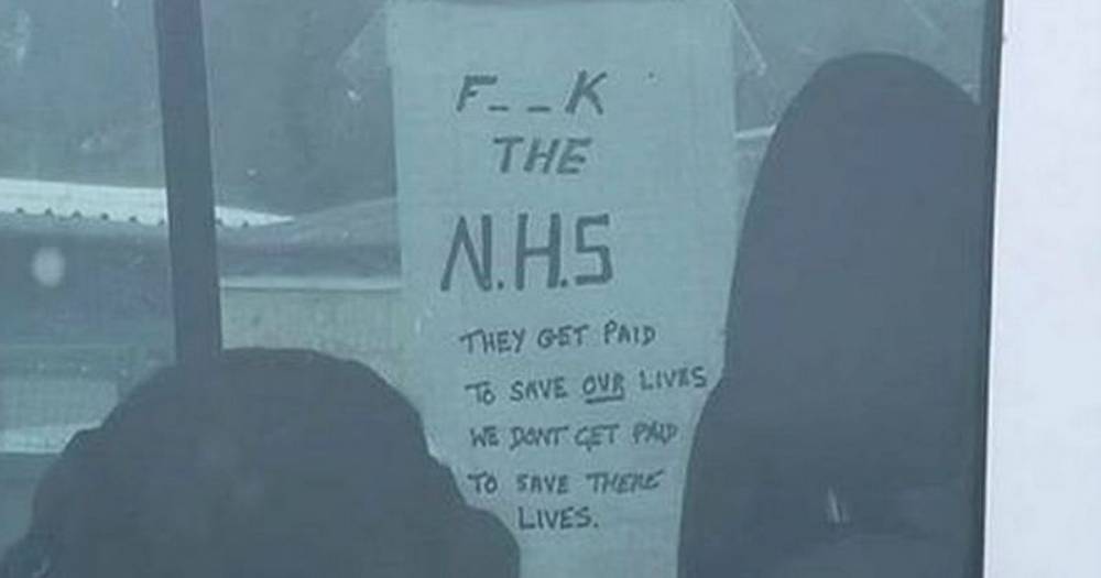 Vile 'f**k the NHS' poster on car window sparks fury while medics risk lives - dailyrecord.co.uk