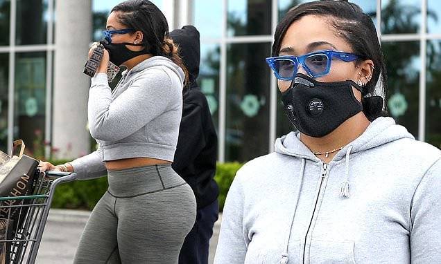 Jordyn Woods teases toned tummy as she makes grocery run in Calabasas during break from quarantine - dailymail.co.uk