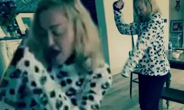 Like A - Madonna and her children liven up their quarantine at home with a kitchen dance party - dailymail.co.uk
