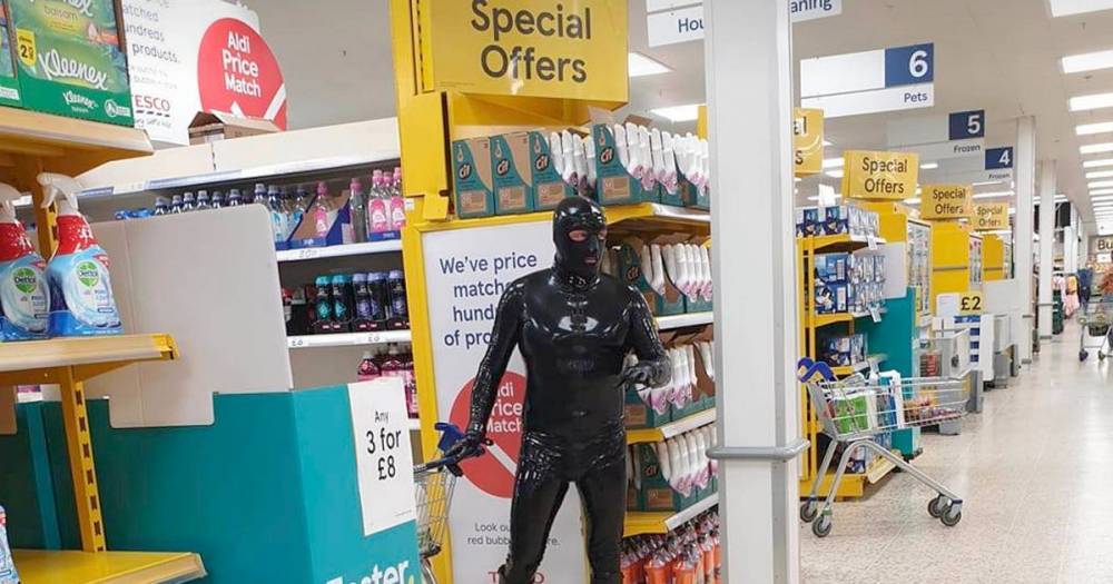 Gimp Man spotted shopping for essentials in Tesco wearing all black latex suit - dailystar.co.uk