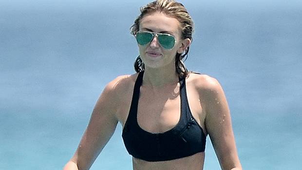 Paulina Gretzky Soaks In The Rays While Lounging In A Bikini In Her Pool - hollywoodlife.com - county Ray